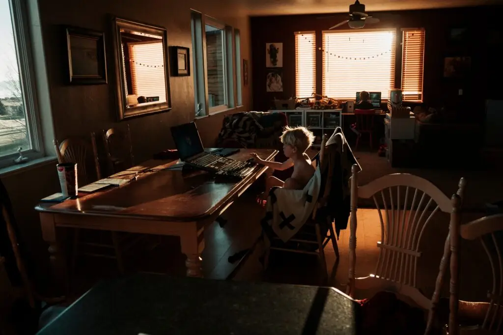 kid watching show on laptop